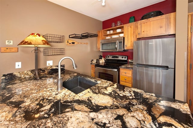 129 River Run Rd Unit 8040, Keystone, CO 80435 - kitchen with stainless steel appliances, a sink, open shelves, and dark stone counters