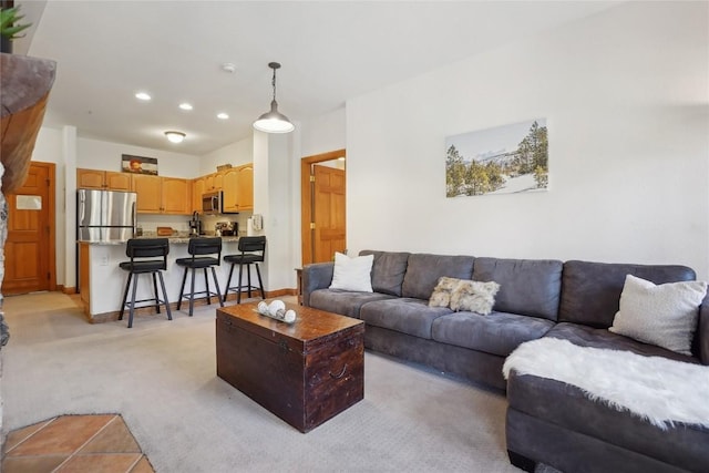 22714 US Highway 6 Unit 5941, Keystone, CO 80435 - living room featuring recessed lighting, baseboards, and light colored carpet