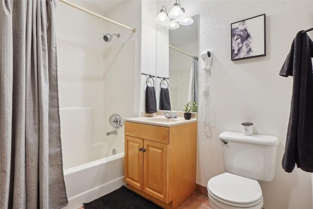 22714 US Highway 6 Unit 5941, Keystone, CO 80435 - bathroom with vanity, tile patterned floors, shower / bath combo with shower curtain, and toilet