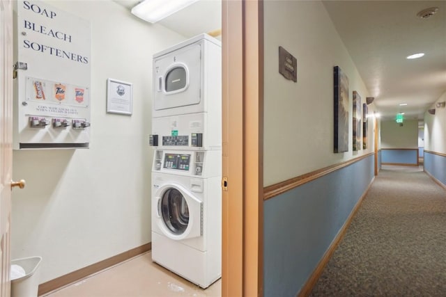 22714 US Highway 6 Unit 5941, Keystone, CO 80435 - shared laundry area with baseboards and stacked washer / dryer