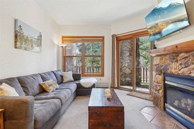 22714 US Highway 6 Unit 5941, Keystone, CO 80435 - living area featuring a stone fireplace and carpet floors