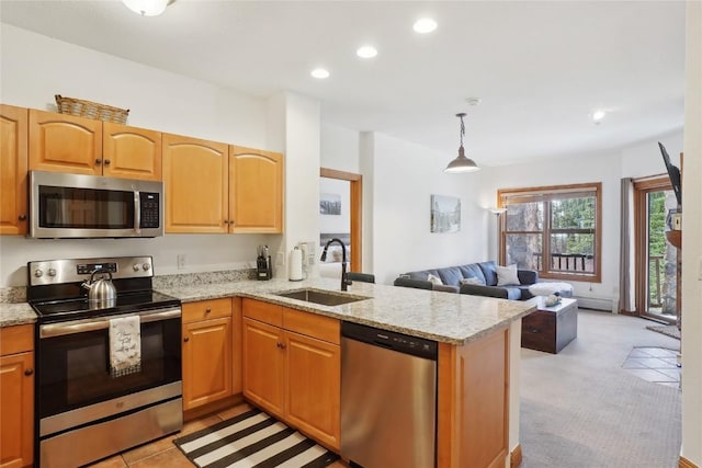22714 US Highway 6 Unit 5941, Keystone, CO 80435 - kitchen featuring a peninsula, open floor plan, recessed lighting, a sink, and appliances with stainless steel finishes