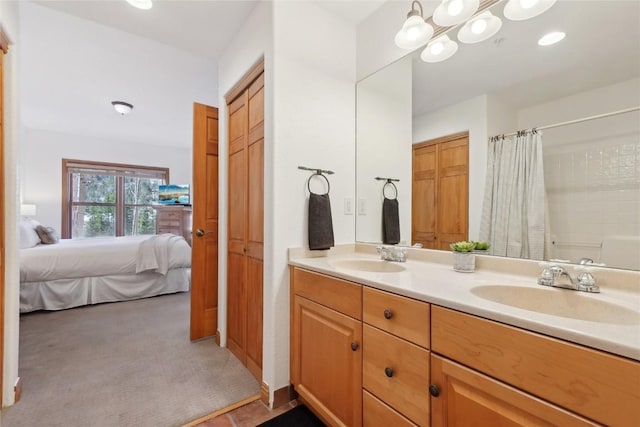 22714 US Highway 6 Unit 5941, Keystone, CO 80435 - bathroom with a sink, a shower with curtain, double vanity, and connected bathroom