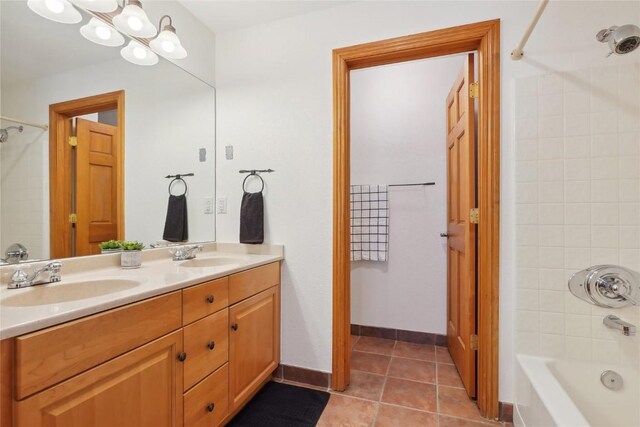 22714 US Highway 6 Unit 5941, Keystone, CO 80435 - full bathroom featuring double vanity, shower / bathtub combination, a sink, and tile patterned flooring