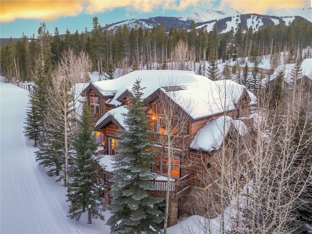 68 Snowy Ridge Rd, Breckenridge, CO 80424 - snowy aerial view with a mountain view and a wooded view