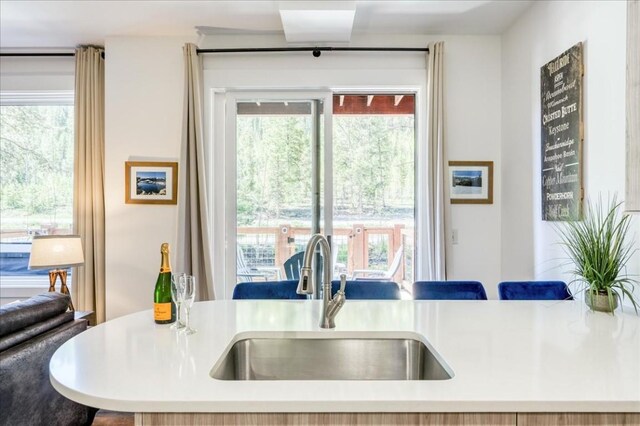 102 Lake Ridge Cir Unit 1888, Keystone, CO 80435 - kitchen featuring healthy amount of natural light and light countertops