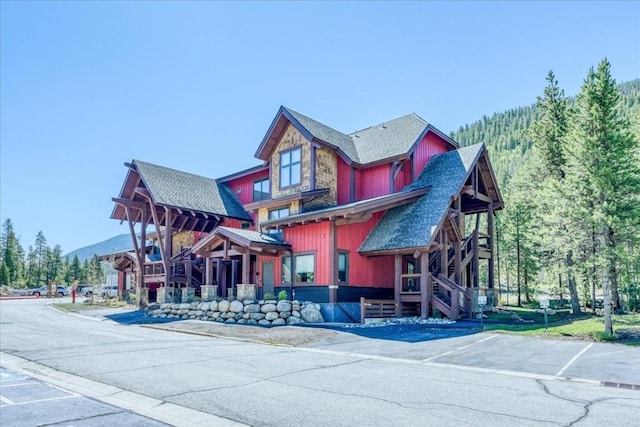 102 Lake Ridge Cir Unit 1888, Keystone, CO 80435 - view of front of house featuring roof with shingles and a mountain view