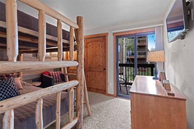 433 Wild Irishman Rd Unit 1039, Keystone, CO 80435 - bedroom featuring access to outside and carpet