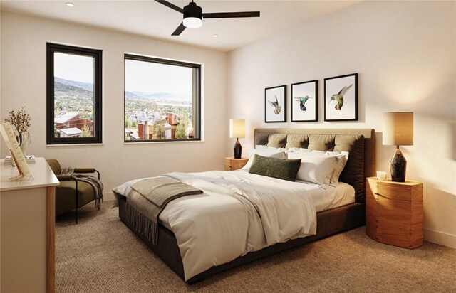 bedroom featuring ceiling fan and light carpet