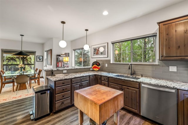 459 Willett Heights Ct, Steamboat Springs, CO 80487 - kitchen featuring dishwasher, a sink, dark wood finished floors, a peninsula, and recessed lighting