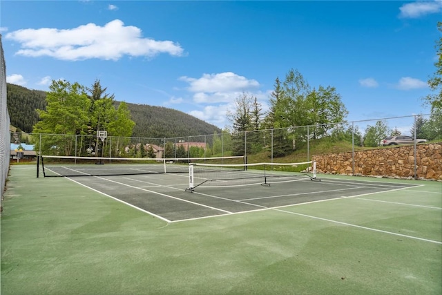 23177 Barbour Dr Unit 14, Keystone, CO 80435 - view of tennis court with community basketball court and a mountain view