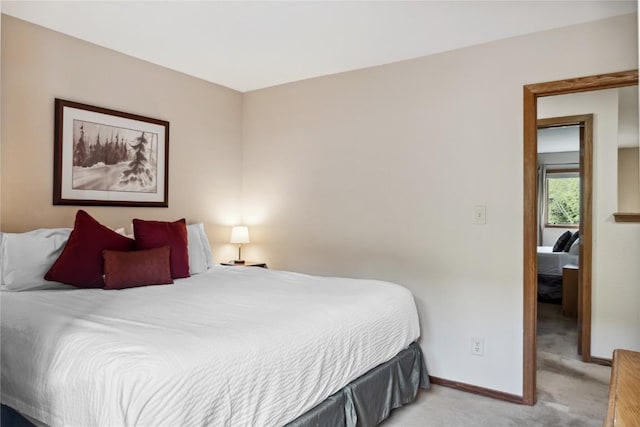23177 Barbour Dr Unit 14, Keystone, CO 80435 - bedroom with baseboards and light carpet