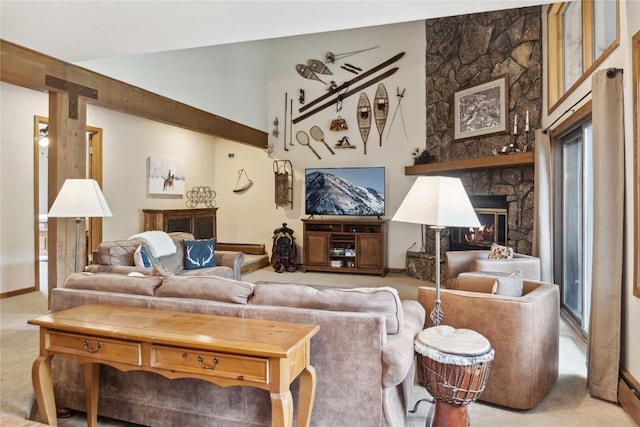 23177 Barbour Dr Unit 14, Keystone, CO 80435 - living area featuring carpet flooring, a fireplace, and a towering ceiling