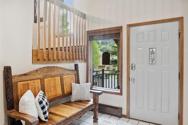 23177 Barbour Dr Unit 14, Keystone, CO 80435 - foyer entrance with baseboard heating and light tile patterned floors