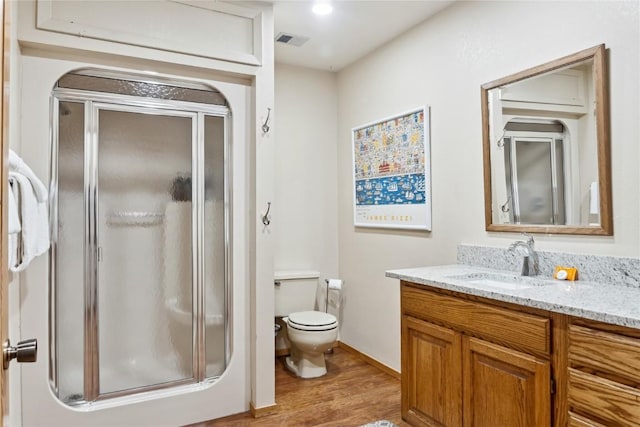 23177 Barbour Dr Unit 14, Keystone, CO 80435 - full bath with a stall shower, vanity, and wood finished floors