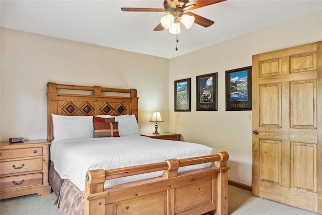 23177 Barbour Dr Unit 14, Keystone, CO 80435 - bedroom with light colored carpet and ceiling fan