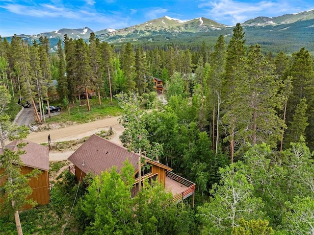 243 Lone Hand Way, Breckenridge, CO 80424 - view from above of property featuring a heavily wooded area and a mountain backdrop