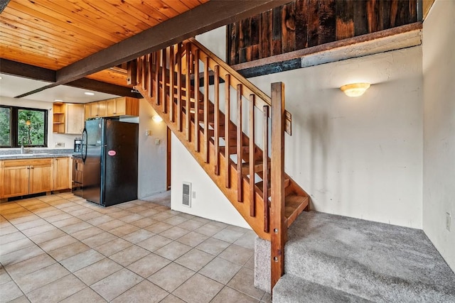 243 Lone Hand Way, Breckenridge, CO 80424 - stairs with tile patterned flooring and a wooden ceiling with exposed beams