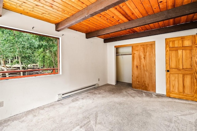 243 Lone Hand Way, Breckenridge, CO 80424 - unfurnished bedroom with a baseboard radiator, carpet, a wood ceiling with exposed beams, and a closet