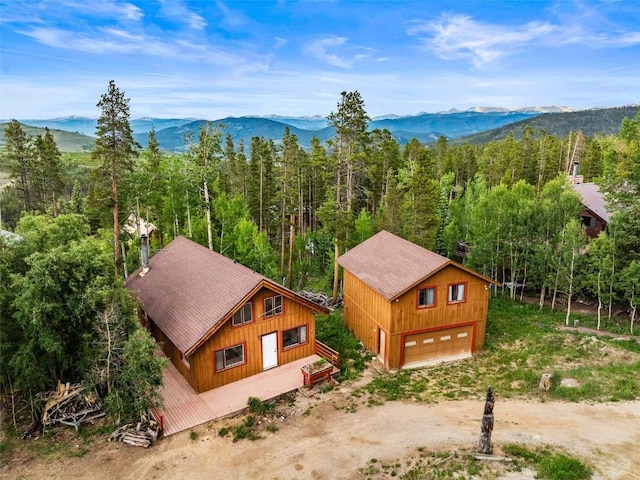 243 Lone Hand Way, Breckenridge, CO 80424 - view from above of property featuring mountains and a heavily wooded area