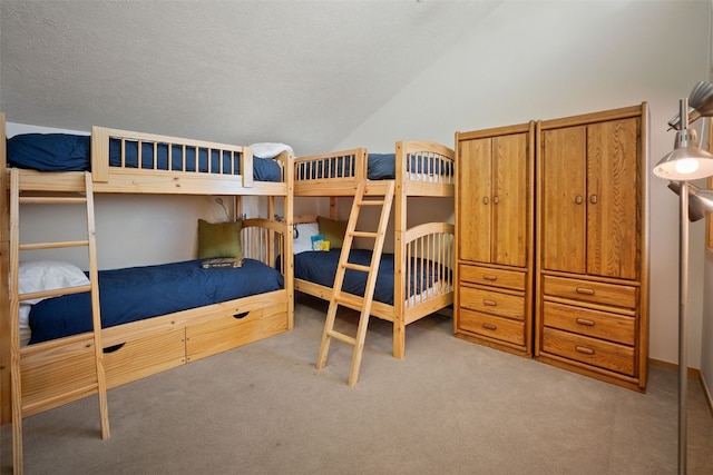 91400 Ryan Gulch Rd Unit 91425, Silverthorne, CO 80498 - carpeted bedroom with lofted ceiling and a textured ceiling