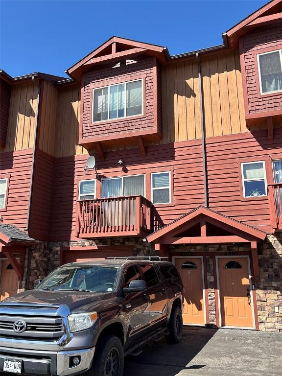 2379 Abbey Ct Unit 3, Steamboat Springs, CO 80487 - view of property with board and batten siding and stone siding