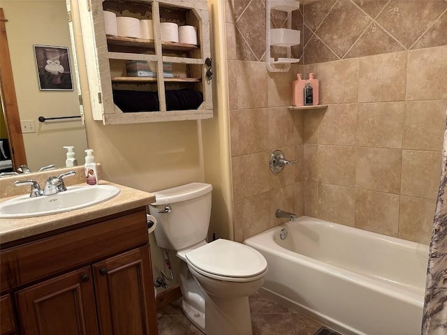 2379 Abbey Ct Unit 3, Steamboat Springs, CO 80487 - full bathroom featuring toilet, shower / bath combo with shower curtain, vanity, and tile patterned flooring