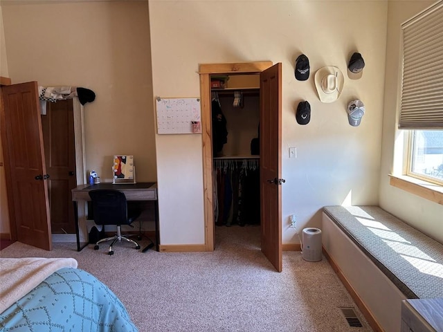 2379 Abbey Ct Unit 3, Steamboat Springs, CO 80487 - bedroom with carpet flooring, a desk, a closet, baseboards, and a walk in closet