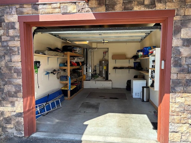 2379 Abbey Ct Unit 3, Steamboat Springs, CO 80487 - garage featuring electric water heater and heating unit