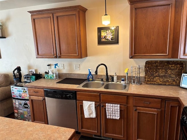2379 Abbey Ct Unit 3, Steamboat Springs, CO 80487 - kitchen with a sink, dishwasher, light countertops, and pendant lighting