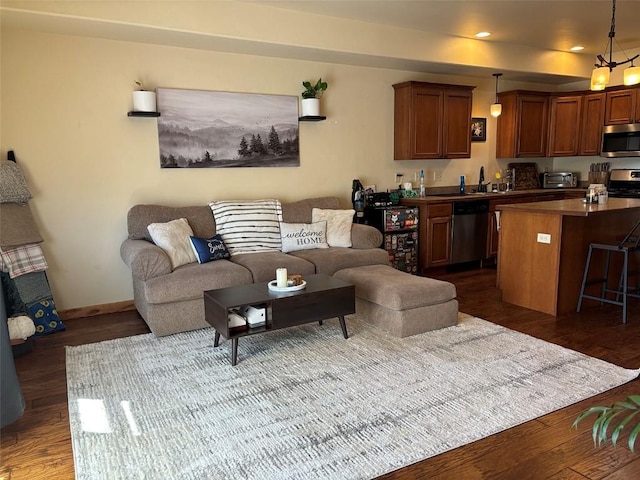 2379 Abbey Ct Unit 3, Steamboat Springs, CO 80487 - living room with dark wood-type flooring, recessed lighting, and baseboards
