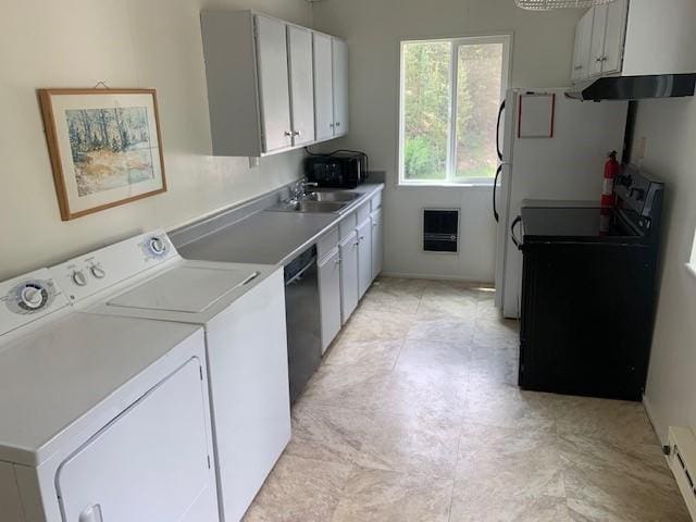 washroom featuring washer and clothes dryer, a baseboard heating unit, and heating unit