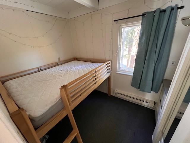 bedroom with a baseboard radiator