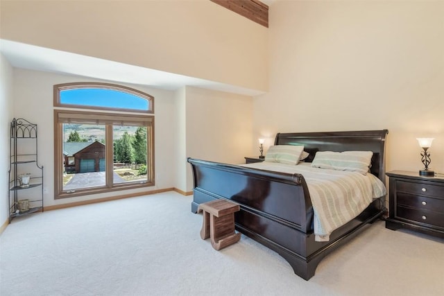 12 Raindance Trl, Dillon, CO 80435 - bedroom with light colored carpet and beam ceiling