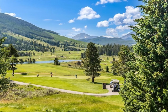 12 Raindance Trl, Dillon, CO 80435 - surrounding community featuring a water and mountain view, view of golf course, and a lawn