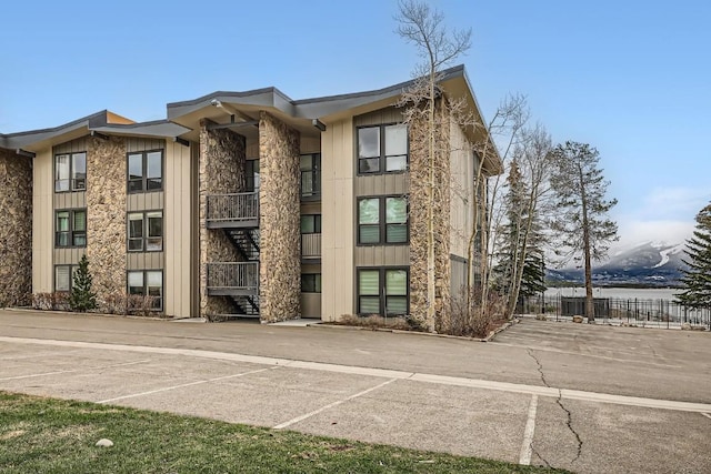 120 E Ln Bonte St Unit 109, Dillon, CO 80435 - view of building exterior with uncovered parking