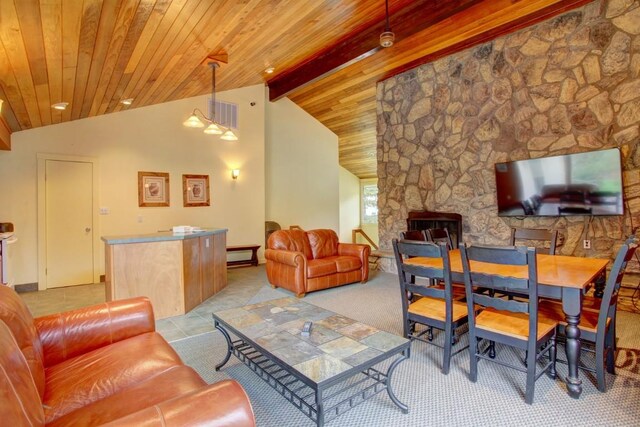 120 E Ln Bonte St Unit 109, Dillon, CO 80435 - living room with wood ceiling, light carpet, light tile patterned flooring, and baseboard heating