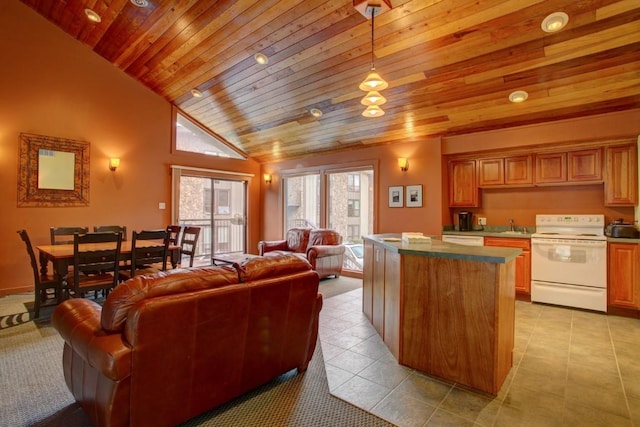 120 E Ln Bonte St Unit 109, Dillon, CO 80435 - kitchen with white appliances, wood ceiling, a sink, lofted ceiling, and a center island