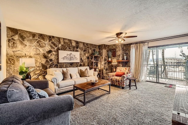 120 E Ln Bonte St Unit 109, Dillon, CO 80435 - carpeted living room featuring a ceiling fan and a textured ceiling
