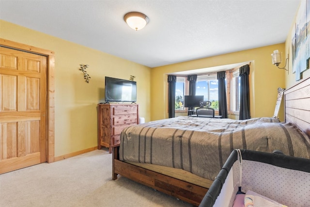 bedroom with light carpet