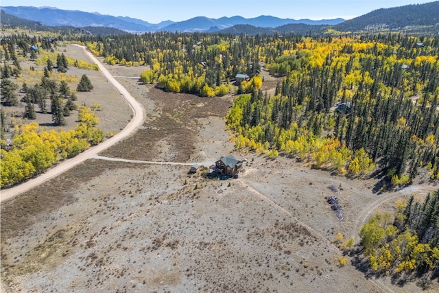 drone / aerial view featuring a mountain view