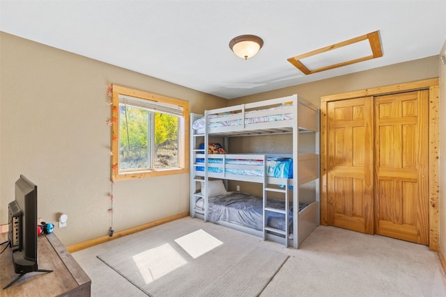 bedroom featuring light carpet