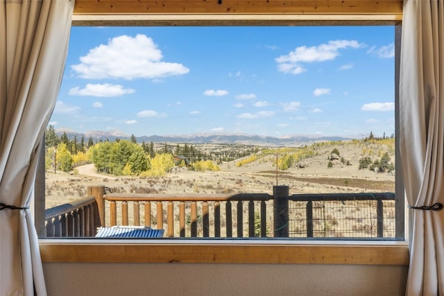 balcony featuring a mountain view