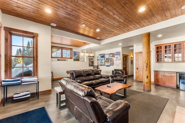 living room featuring a dry bar, recessed lighting, wood ceiling, and baseboards