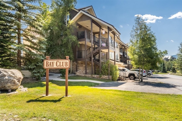 view of property featuring stairway