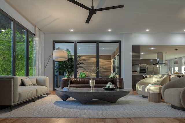 living room with recessed lighting, a ceiling fan, and wood finished floors