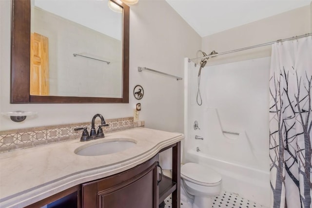 bathroom featuring toilet, shower / bath combination with curtain, and vanity