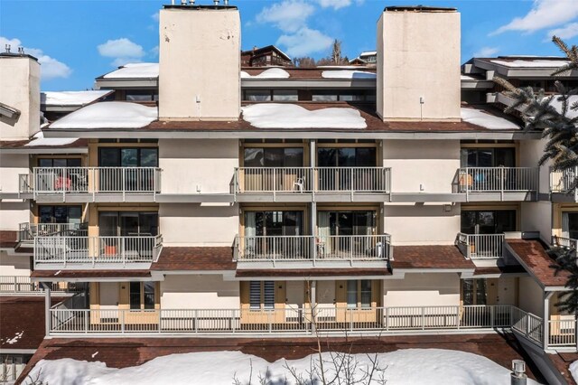 view of snow covered building