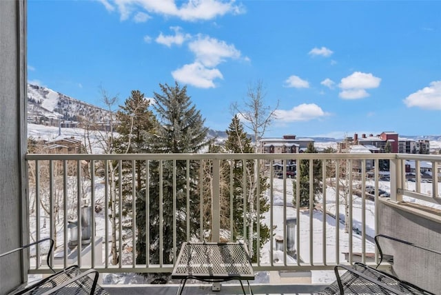 balcony featuring a mountain view