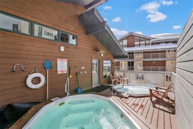 view of swimming pool with an indoor in ground hot tub